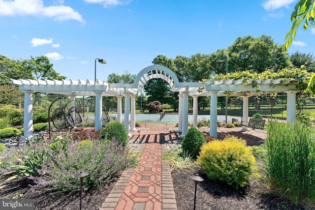 surrounding community with a pergola