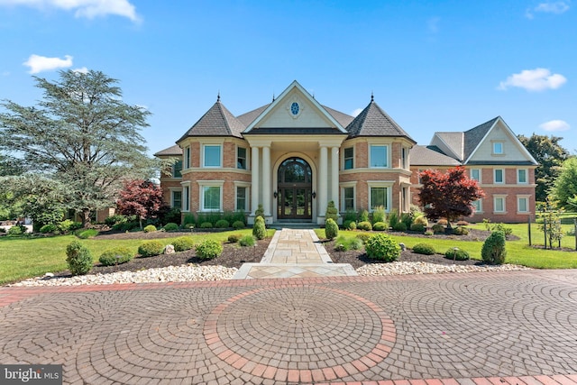 victorian house featuring french doors