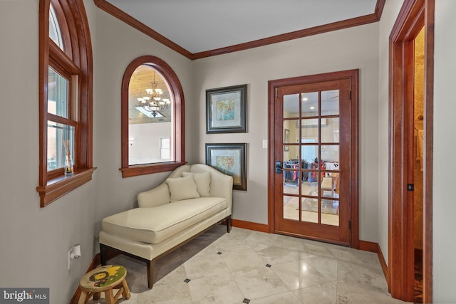 living area with ornamental molding and an inviting chandelier