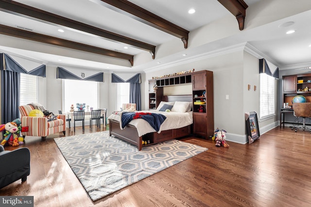 bedroom featuring multiple windows, crown molding, and dark hardwood / wood-style flooring