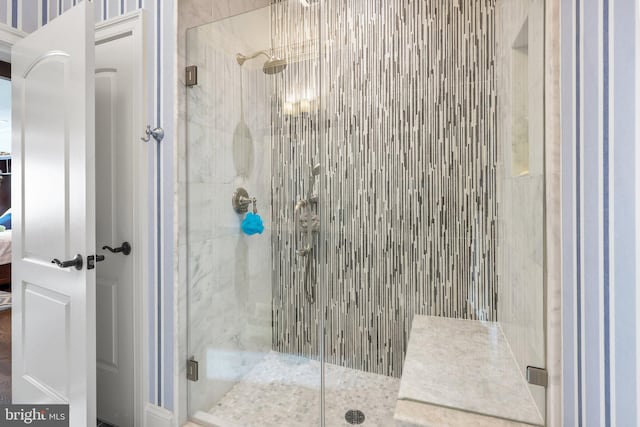 bathroom featuring an enclosed shower