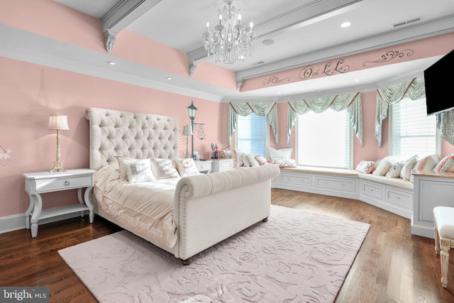 bedroom featuring hardwood / wood-style flooring, an inviting chandelier, multiple windows, and crown molding