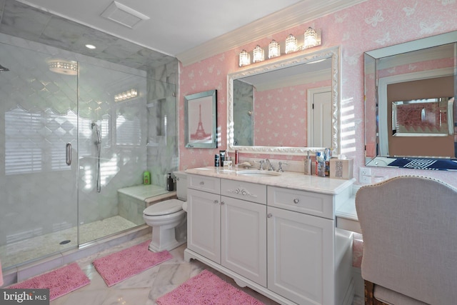 bathroom featuring vanity, toilet, and walk in shower