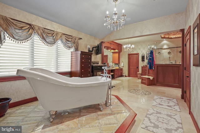 bedroom featuring a chandelier and vaulted ceiling