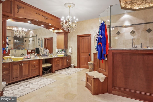 bathroom featuring vanity, an enclosed shower, crown molding, and a chandelier