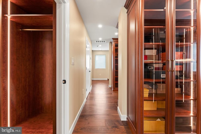 hall featuring dark wood-type flooring