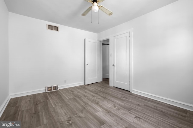 unfurnished bedroom featuring ceiling fan and light hardwood / wood-style flooring