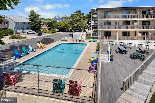 view of pool featuring a patio