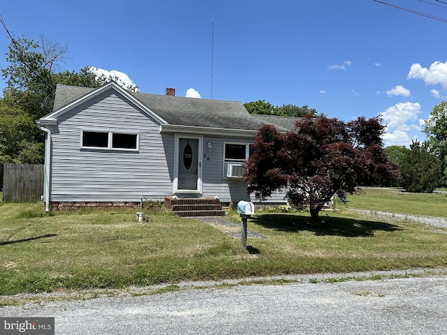 view of front of home with a front yard