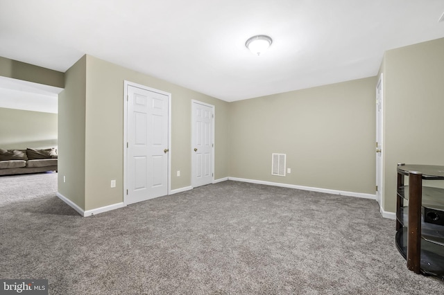 unfurnished bedroom featuring carpet