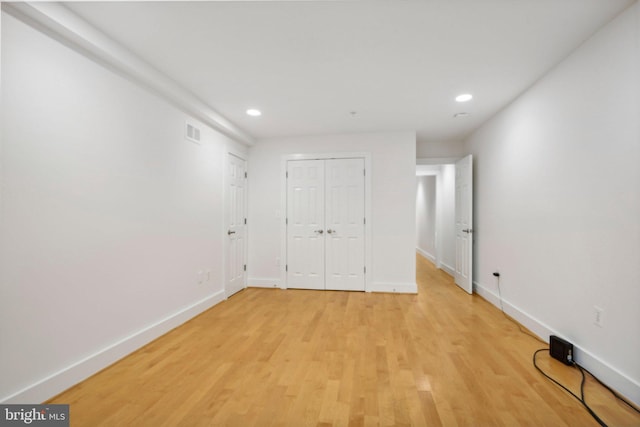 unfurnished bedroom featuring light hardwood / wood-style flooring