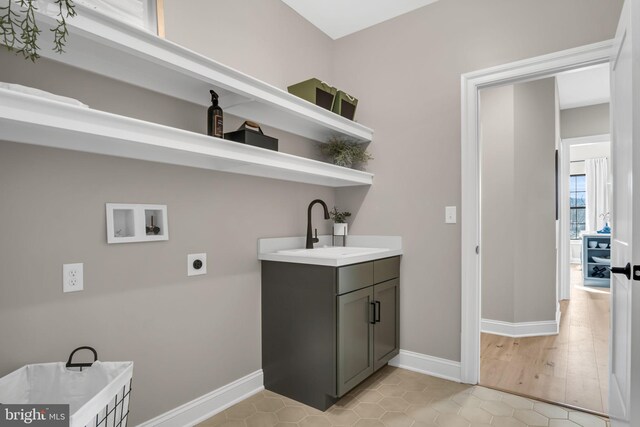 263 Breeches Run Unit 76, Boiling Springs, PA 17007 - washroom featuring electric dryer hookup, washer hookup, baseboards, and cabinet space