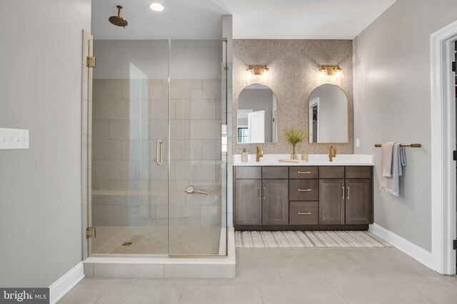 263 Breeches Run Unit 76, Boiling Springs, PA 17007 - bathroom featuring double vanity, a shower stall, baseboards, and tile patterned flooring