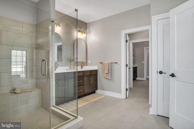263 Breeches Run Unit 76, Boiling Springs, PA 17007 - full bathroom with double vanity, a shower stall, tile patterned floors, and baseboards