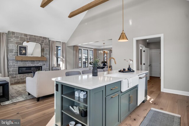 263 Breeches Run Unit 76, Boiling Springs, PA 17007 - kitchen featuring a stone fireplace, beamed ceiling, open floor plan, light wood-style floors, and high vaulted ceiling