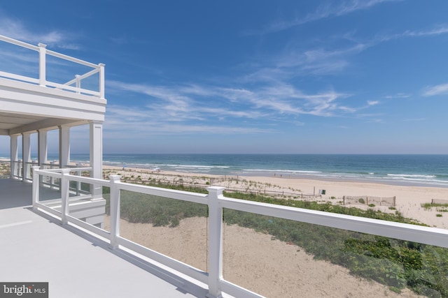 view of water feature with a beach view