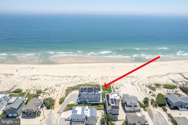 aerial view featuring a beach view and a water view