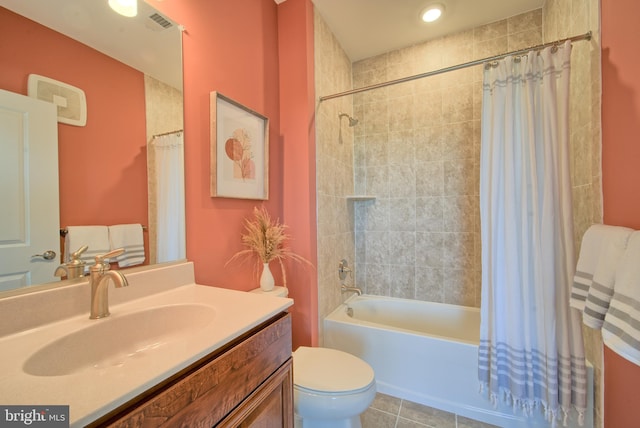 full bathroom with tile patterned floors, vanity, toilet, and shower / bathtub combination with curtain