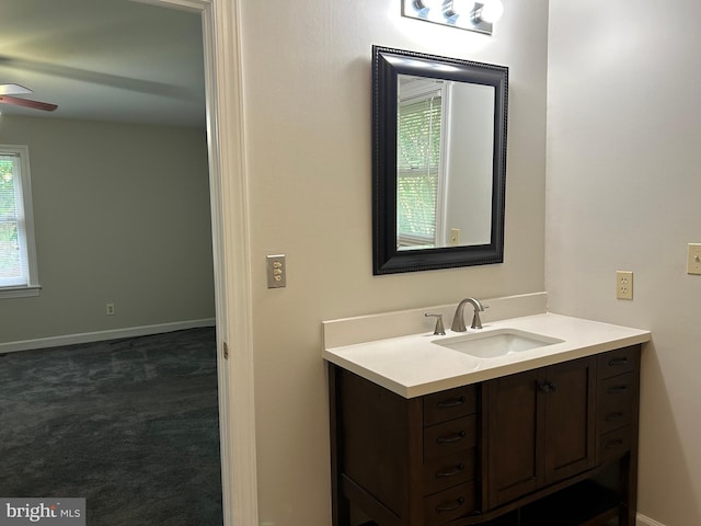 bathroom featuring vanity and a healthy amount of sunlight