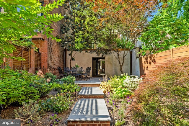 rear view of house with a patio