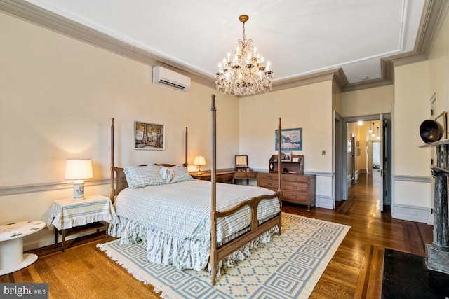 bedroom featuring crown molding, a wall mounted AC, a notable chandelier, and dark wood-type flooring