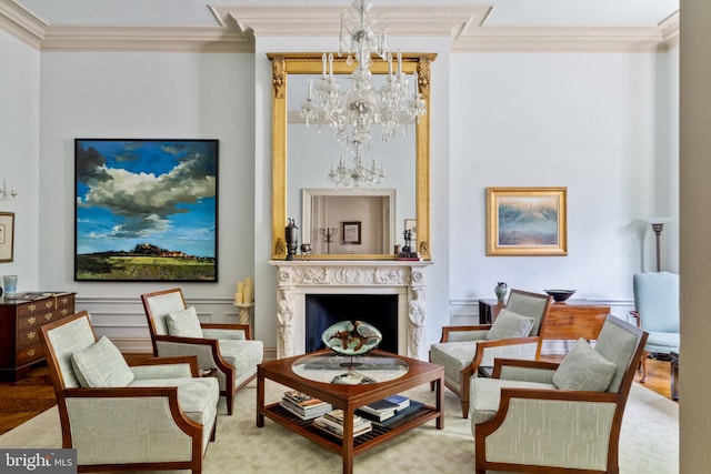 sitting room with ornamental molding and an inviting chandelier