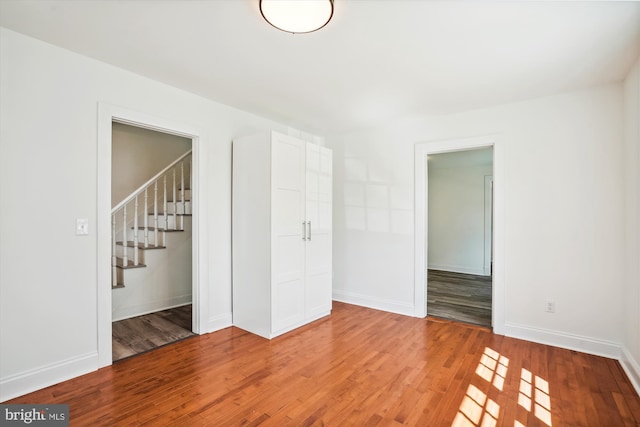 spare room featuring light wood-type flooring