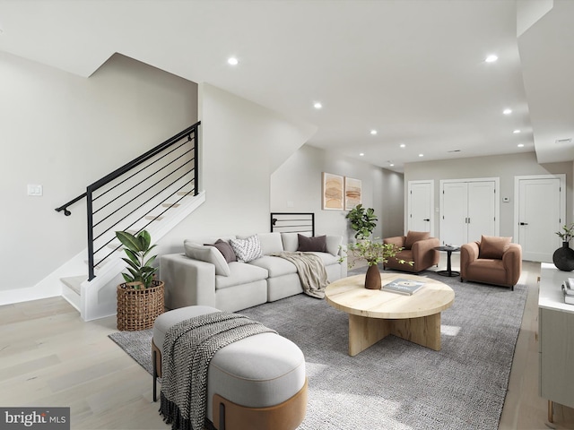 unfurnished living room with light wood-type flooring