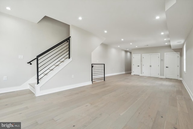 spare room featuring light hardwood / wood-style floors