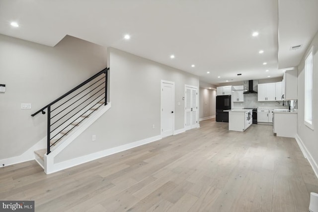 interior space with light hardwood / wood-style floors