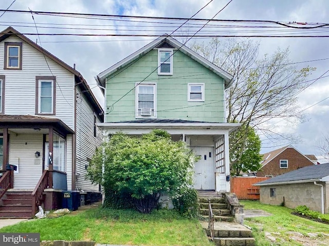 view of front of property with a front yard