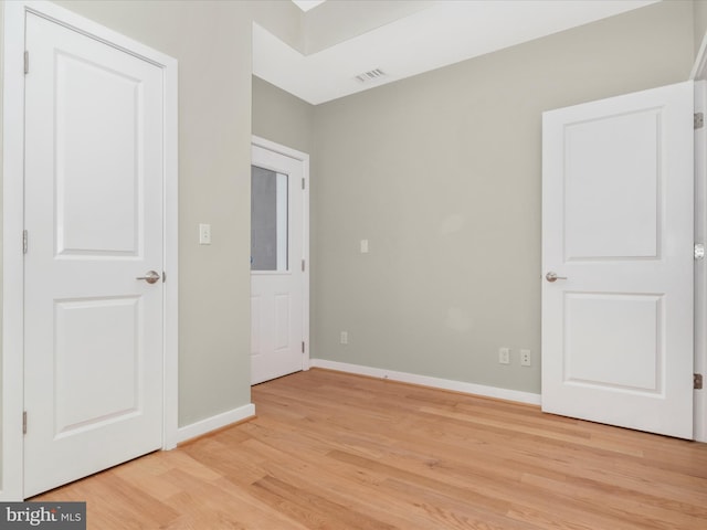 unfurnished bedroom with light hardwood / wood-style floors