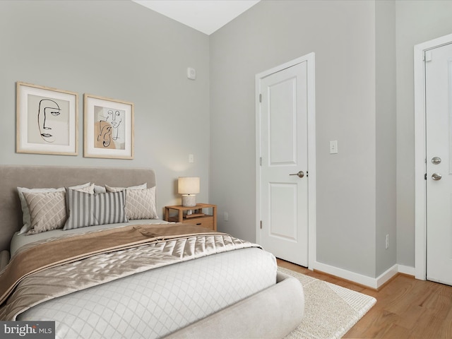 bedroom featuring light wood-type flooring