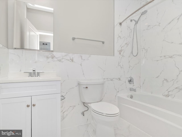 full bathroom featuring toilet, vanity, tile walls, and tub / shower combination