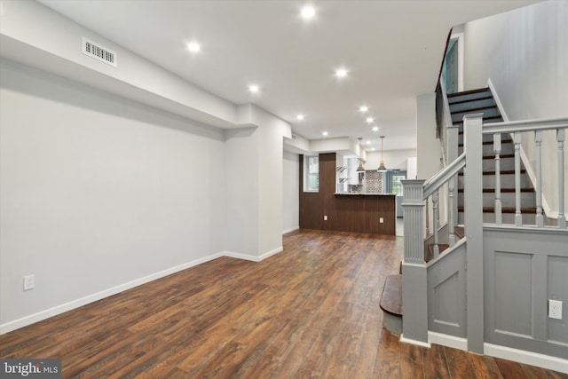 interior space with dark hardwood / wood-style floors