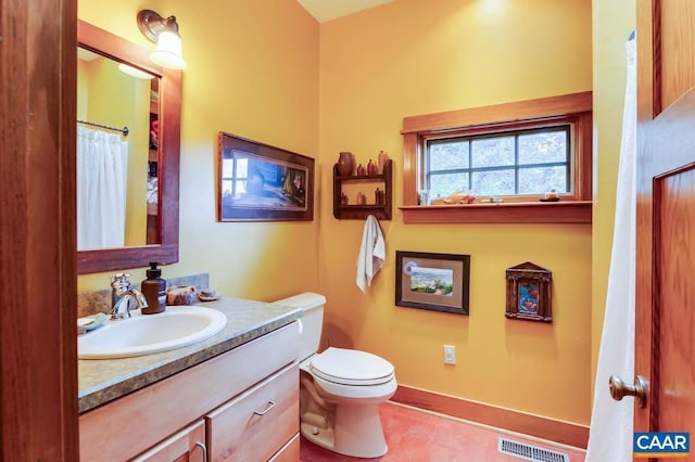 full bathroom with baseboards, visible vents, vanity, and toilet