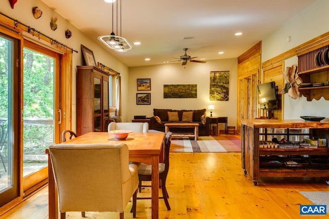 dining area with light wood-style flooring, visible vents, ceiling fan, and recessed lighting