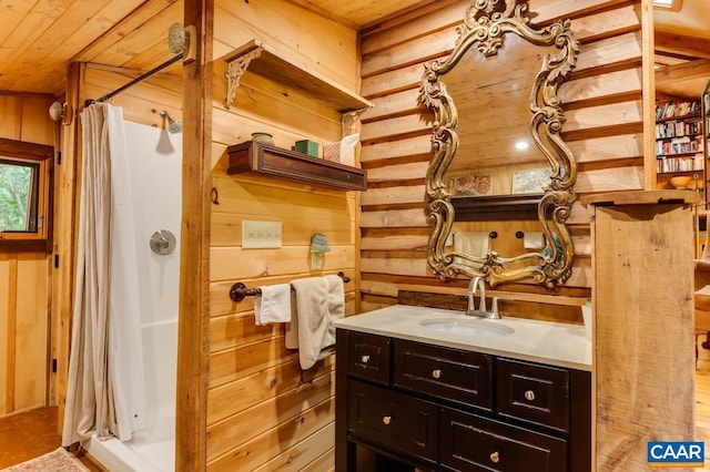 bathroom featuring wooden ceiling, wooden walls, vanity, and a shower with shower curtain