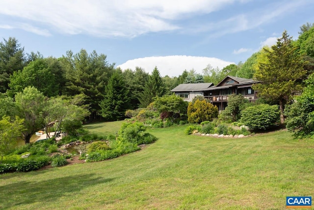 view of yard with a deck