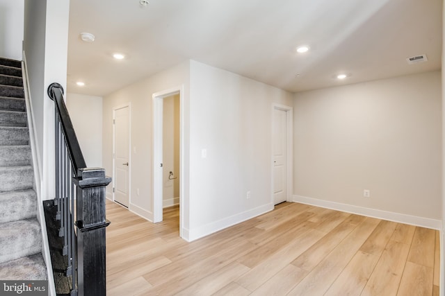 bedroom with light colored carpet