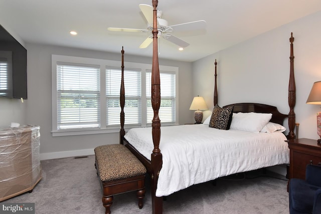 carpeted bedroom with ceiling fan