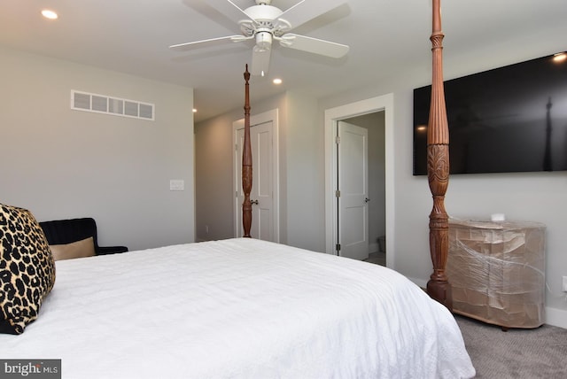 bedroom with carpet flooring, ceiling fan, and a closet