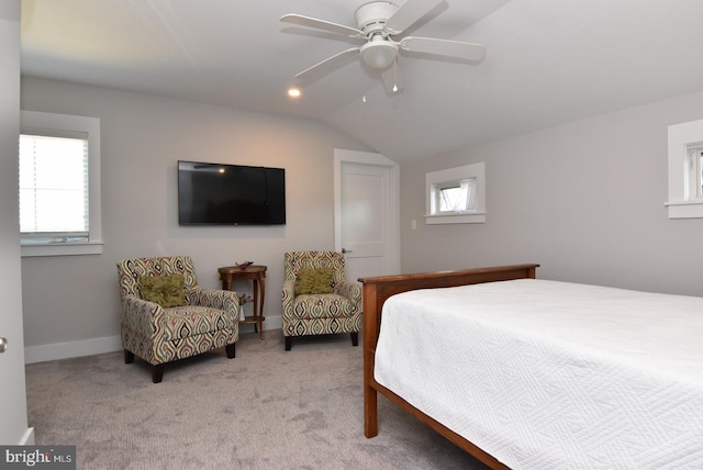 bedroom featuring light colored carpet, ceiling fan, and lofted ceiling