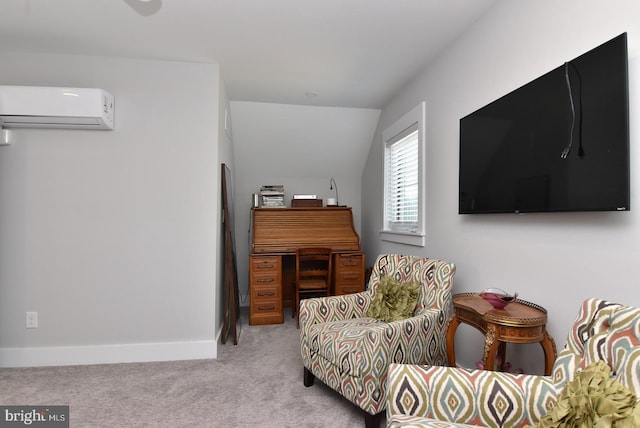 sitting room featuring a wall mounted AC, light colored carpet, and vaulted ceiling