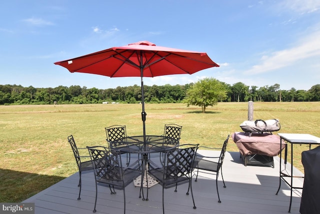 deck featuring a lawn