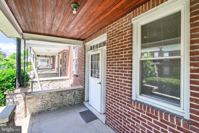 property entrance with a porch