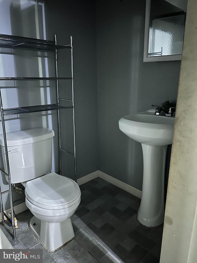 bathroom featuring toilet