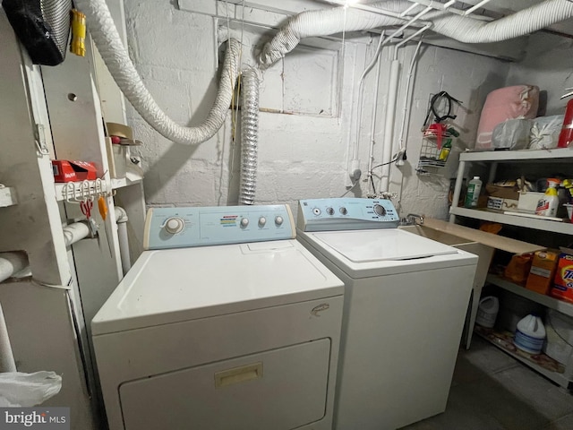 laundry room with washer and dryer