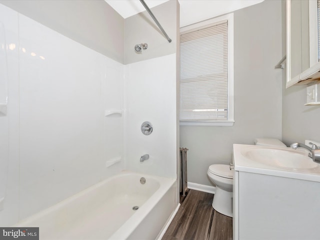 full bathroom with vanity, toilet, shower / bathing tub combination, and hardwood / wood-style flooring