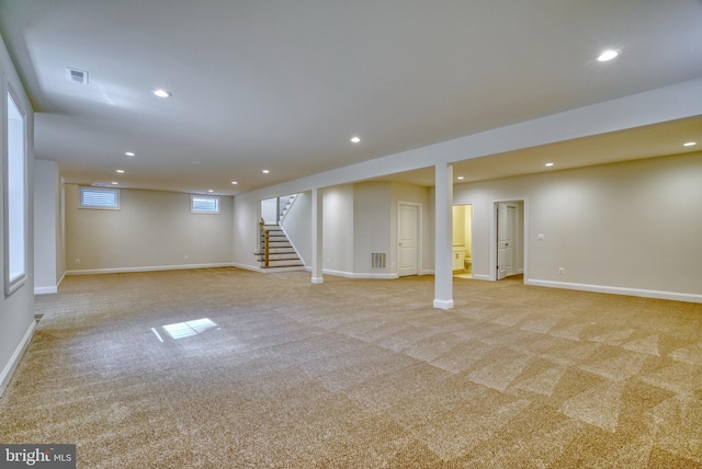 basement with light carpet